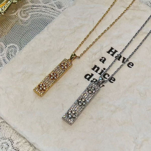 Pavé three-flower four-leaf clover necklace