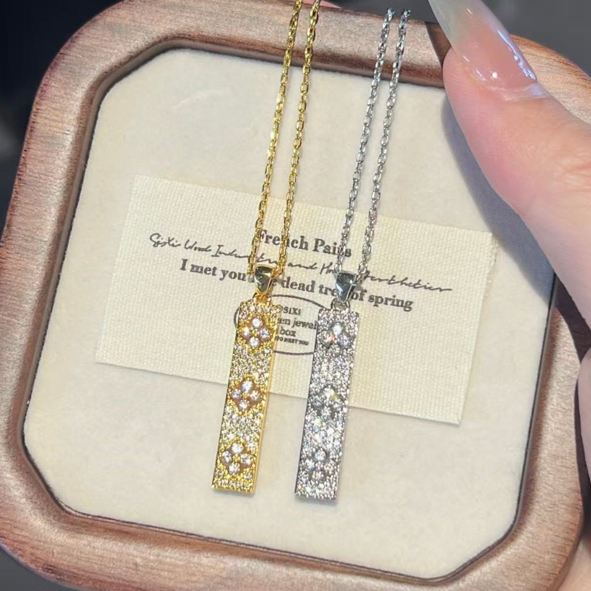 Pavé three-flower four-leaf clover necklace